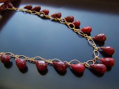 Handmade, Indian Red Ruby Necklace, 12k Gold, luxury statement, gemstone jewelry, gift for her, this beautiful necklace features: 14k gold filled metal parts, gold vermail toggle clasp, dark red, opaque Ruby briolettes from India, total of 34 stones, each measuring approximately 6x11mm.  The standard necklace measures 18 inches long, plus an extender.  If you want longer necklace, contact for the price.I can make this necklace in sterling silver or with different chain and clasp.Matching jewelry Red Ruby Necklace, Unique Statement Necklace, Gold Luxury, Healing Necklace, Ruby Necklace, Protection Necklace, Matching Jewelry, Red Ruby, Gold Earrings Dangle