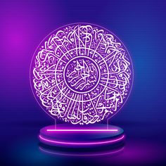 an illuminated lamp with arabic calligraphy on the base in purple and blue colors, against a dark background