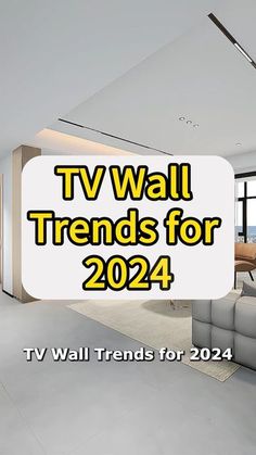 a living room filled with furniture and a flat screen tv sitting on top of a wall