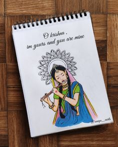 a spiral notebook with an image of a woman playing the flute