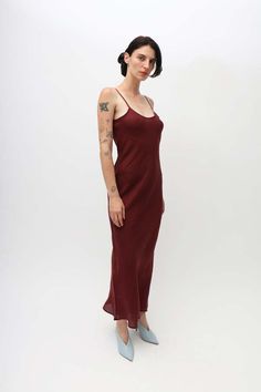 Fine linen slip dress in burgundy featuring a bias cut and adjustable spaghetti straps. Red Slip Dress With Spaghetti Straps And Bias Cut, Red Bias Cut Slip Dress For Date Night, Red Bias Cut Slip Dress With Spaghetti Straps, Linen Slip Dress, Fine Linen, Organic Fabrics, Mid Dresses, Easy Wear, Designer Outfits Woman