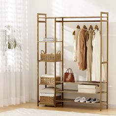 a clothes rack with shoes and purses on it next to a white rug in a room