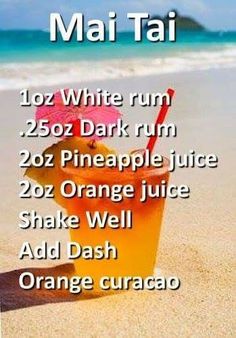 an orange juice drink sitting on top of a sandy beach next to the ocean with words written below it