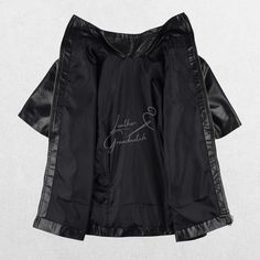 Add a chic and edgy touch to your wardrobe with our Women's Black Faux Leather Short-Sleeve Jacket. Designed for the modern woman who loves to stand out, this jacket offers a perfect blend of style and comfort. Made from high-quality faux leather, it delivers the sophisticated look of real leather without compromising on comfort or ethical values. Key Features: Premium Faux Leather: Crafted from high-quality faux leather, this jacket has a luxurious finish that mirrors the look and feel of genui Short Sleeve Leather Jacket, Classic Leather Jacket, Semi Formal Wear, Black Leather Shorts, Jacket With Zipper, Short Sleeve Jacket, Black Faux Leather Jacket, Leather Short, Leather Shorts