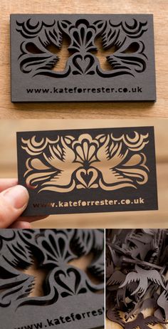 the business card is designed to look like an intricate design, and has been cut out from