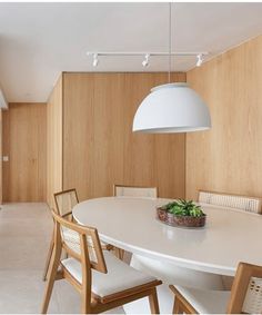 a white table and chairs in a room