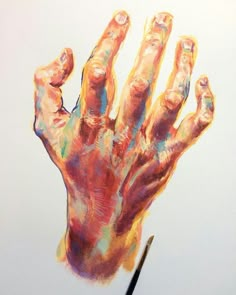 a drawing of a hand with colored paint on it and a pencil in the foreground