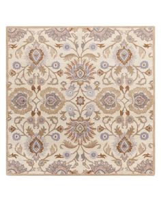 an area rug with flowers and leaves on the side, in beige and blue colors