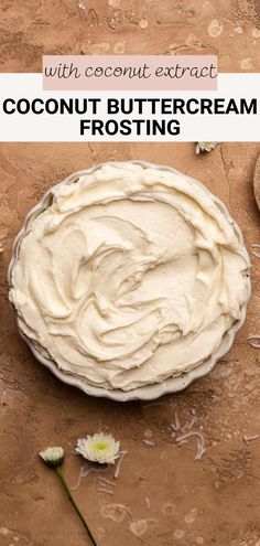 coconut buttercream frosting in a pie pan on a wooden table with flowers