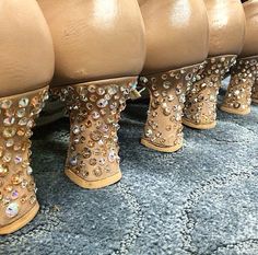 there are many pairs of boots with sequins on them