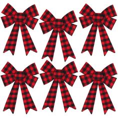 six red and black bows with one large bow on the top, two smaller bows on the bottom