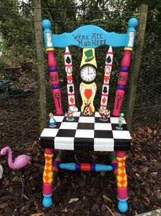 a colorful chair with a clock on it