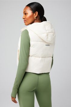 Essential Cropped Hooded Puffer Vest Fabletics white female Activewear >> Womens >> Jackets & Outerwear >> Jackets regular Everyday Hidden Pockets/Reflective/Water-Resistant Cropped Puffer Vest Outfit, Cropped Puffer Vest, Puffer Vest Outfit, Hooded Puffer Vest, Female Activewear, 2024 Wishlist, Womens Jackets, Vest Outfits, Puffer Vest