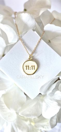 11:11 is rooted in numerology and can have spiritual meaning.  Seen as an angel sign, 11:11 is associated with new beginnings.   This beautiful necklace has an 18K Gold-Filled 11:11 pendant with white enamel.  Set on a 16" adjustable length gold necklace.  It's a simply beautiful necklace for everyday wear.   11:11 Pendant is 100% lead and nickel free, hypoallergenic, anti tarnish and waterproof. Necklace chain is a gold color metal with lobster clasp. Allergy Disclaimer: Some people are allergi 1111 Necklace, Waterproof Necklace, Jewelry Angel, Angel Number Necklace, Angel Signs, Spiritual Necklace, Number Necklace, Spiritual Meaning, Angel Number