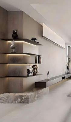 a living room filled with lots of furniture next to a wall mounted bookcases