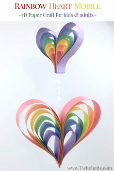 the rainbow heart mobile is made from paper craft for kids and adults to play with