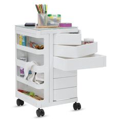 a white rolling cart with drawers and various items on it's wheels, against a white background