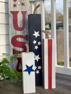 patriotic decorations are displayed on the front porch