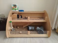 a wooden shelf filled with lots of different items