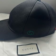 Gucci Hat Very Good Condition, Dust Bag Included Designer Adjustable Hats For Travel, Classic Gucci Baseball Cap, Elegant Gucci Adjustable Hat, Casual Gucci Hat With Embroidered Logo, Designer Flat Brim Travel Hat, Casual Gucci Cap, Designer Visor Hats For Travel, Designer Baseball Cap For Travel, Designer Flat Brim Hat For Travel