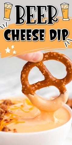 a hand holding a pretzel over a bowl of dip with the words beer cheese dip above it