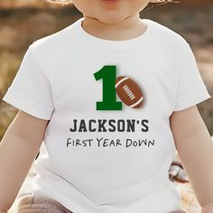 Football Theme First Year Down Birthday Tee Add custom text to the back to provide any additional information needed for your guests. First Birthday Football Theme, Birthday Football Theme, Birthday Football, Down Boy, Football Theme, Football Themes, First Birthday Shirts, Football Birthday, 1st Year