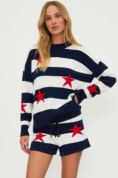 The Callie Sweater is our oversized, crew neck sweater featured in a soft knit fabrication with ribbed knit trim. Now available in a white and navy stripe with red stars.  This cozy sweater can be pulled on post beach trip, as a comfy lounge set with the matching Balboa Short or even styled with the Tia short in Denim Daze. It's the perfect set to wear from Memorial Day to 4th of July and beyond. Match your mini in the Little Callie and Balboa in Liberty Stars. American Flag Sweater, Red Stars, Comfy Lounge, Beach Riot, 4th Of July Outfits, One Piece Swim, Cozy Sweater, Balboa, Lounge Set