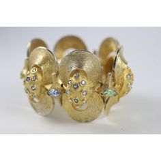 This is part of Chairish’s Costume Jewelry assortment.  Striated goldtone double clamshell style bracelet with aurora borealis rhinestones. Decor Guide, 1950s Fashion, Aurora Borealis, Fashion Bracelets, Gold Finish, Costume Jewelry, Vintage Antiques, Aurora, Gold Tones