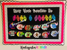 a bulletin board is decorated with colorful magnets and paper clips to spell out the word may your school be