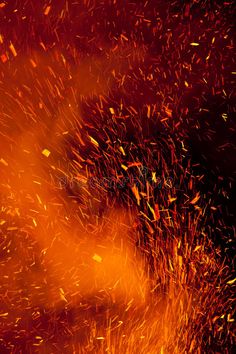 bright orange and red fire with lots of sparks in the air royalty images stock photos