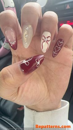 Sparkling Nail Design Ideas for a Aesthetic Radiance Gel X Nail Designs Almond Christmas, Red Coquette Nail Ideas, Red French Bow Nails, Coquette Nails Ideas, Maroon Bow Nails, Nail Inspo Cherry Red, Red Holiday Nails Almond, Red And White Bow Nails, Heart And Bow Nails