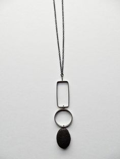 Silver & Stone Necklace - An oval of lava rock is situated beneath cast and fabricated oxidized sterling silver textured shapes.<br><br>Sterling silver chain long enough to slip over the head with no clasp. Silver Jewlery, Onyx Necklace, Artful Home, Wire Work Jewelry, Cabochon Jewelry, Cabochons Stones, Work Jewelry, Lava Rock, Geometric Necklace