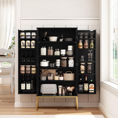 an organized pantry in the corner of a room