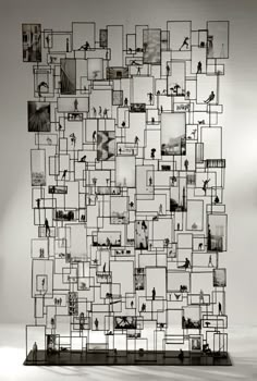 a sculpture made out of squares and photos