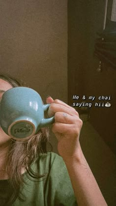 a woman drinking from a blue coffee cup with the words me and my chat saying him