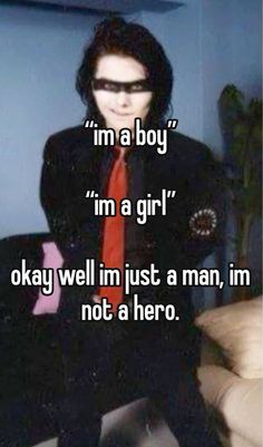 a man in a suit and tie with the caption i'm a boy im a girl okay well just a man, not a hero