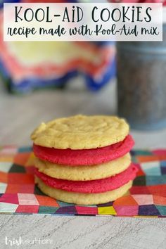 three cookies stacked on top of each other with the words kool aid cookies next to them