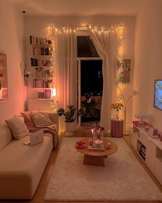 a living room filled with furniture and a flat screen tv