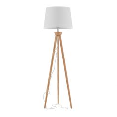 a wooden tripod floor lamp with a white shade on the top and an electric plugged in