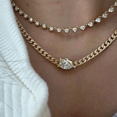 A new addition to our chain & diamond necklace family, the one-of-a-kind Envoy Curb Chain Necklace is an edgy and feminine necklace that is sure to amp up any neck stack. Handcrafted in 18-karat yellow gold and featuring a 1.51ct H / SI2 pear-shaped diamond in an east-west setting on our signature satin-finished Stevie Chain. Handcrafted in 18-Karat Yellow Gold Solid 14 - 16 Inch Stevie Gold Chain White Diamonds: 1.32ct H/SI2 Pear-Shaped Diamond Removable 2-inch Chain Extender Included Made in New York City Neck Stack, Necklace Family, Feminine Necklace, Chain Diamond, Curb Chain Necklace, Gold Chain With Pendant, Gem Necklace, Chain Extenders, Diamond Chain