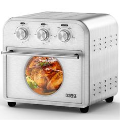 an image of a toaster oven with food in the front and on the side