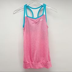 * Nwt Nike Girls Pink Tank Size Large *Features A Loose Fitting Pink Tank With Built In Blue Bra *5c82620eswtrmn Nike Stock, Baseball Tank Top, Girls Sportswear, Kids Sportswear, Nike Neon, Blue Bra, Nike Tank Tops, Nikes Girl, Tanktop Girl