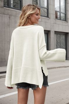 Wrap yourself in comfort and style with our Kerry Oversized Pullover Sweater! This cozy sweater features an oversized fit, perfect for lounging or layering. With its soft fabric and flattering design, you'll never want to take it off. Stay cozy and stylish all day long! Size Guide: Model is 5’8” tall, and has a 32.7” bust, 24.2”waist, & 35.8” hips. She is wearing a S / US 4 / AU 8. This sweater is true to size. Feature: Crew ribbed neckline. Cuffs & hem. Outer sew detail. Long wide sleeves. Side slits. Oversized Relaxed Fit. Maternity friendly. Material: 42% Acrylic, 30% Polyester, 28% Nylon. Care Instructions: Machine wash / Cold hand wash. Oversized Pullover Sweaters, Take It Off, Oversized Pullover, Cozy Sweater, Ribbed Neckline, Stay Cozy, Wide Sleeves, Cozy Sweaters, Pullover Sweater