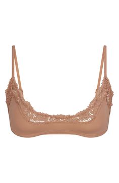 From Kim Kardashian's iconic SKIMS, this scoop-neck bralette is stretchy for all-day comfort and designed with dainty lace for a hint of romance. Partially lined 76% polyamide, 24% elastane Machine wash, tumble dry Imported Mesh Bra, Lace Underwire, Corded Lace, Triangle Bralette, Underwire Bra, Lace Bralette, Second Skin, Lace Detail, Pullover Styling