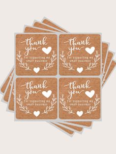 six thank cards with the words thank you and hearts in white ink on brown paper