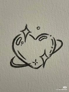 a drawing of a heart on the side of a wall