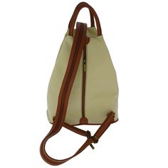 This stylish Italian women's handbag, shoulder bag, and a backpack all-in-one is hand-made of soft genuine leather in a long-established artisan leather workshop in Florence, Italy. This family workshop continues the ancient Italian tradition of genuine leather craftsmanship. Made from the highest quality Italian calfskin leather with attention to every detail, this elegant women's backpack is versatile, spacious, secure, and super-stylish. It easily fits everything you need for your busy day, o Elegant Beige Leather Travel Backpack, Classic Beige Backpack With Detachable Strap, Classic Beige Leather Backpack With Adjustable Strap, Elegant Beige Travel Backpack, Beige Leather Backpack With Zipper For On-the-go, Classic Beige Backpack With Adjustable Strap, Classic Beige Backpack With Zipper Closure, Satchel Backpack With Leather Handles For Errands, Beige Leather Backpack With Zipper Closure For On-the-go