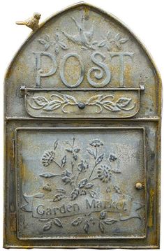 an old mailbox with a bird on it's top and the word post written in