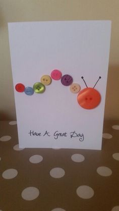 a card with buttons on it that says have a great day