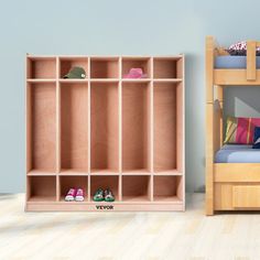 a wooden bunk bed sitting next to a shelf filled with shoes